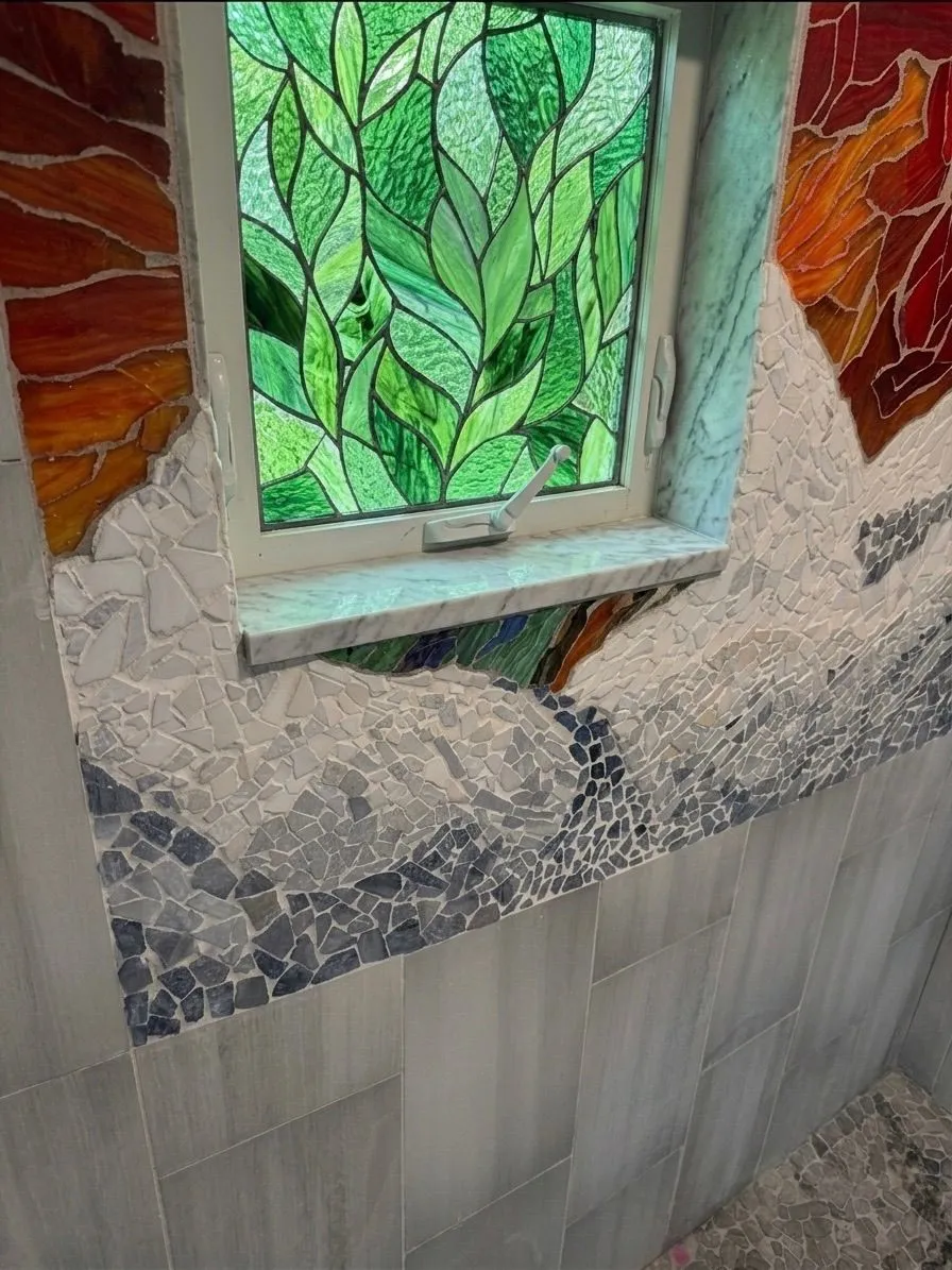 A close view of hand-cut glass mosaic craftsmanship