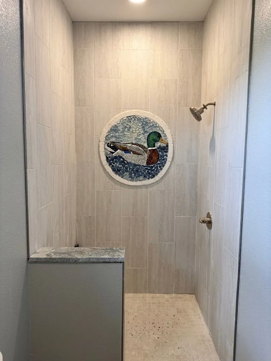 Custom mallard duck medallion in a shower mosaic in Cripple Creek, Colorado