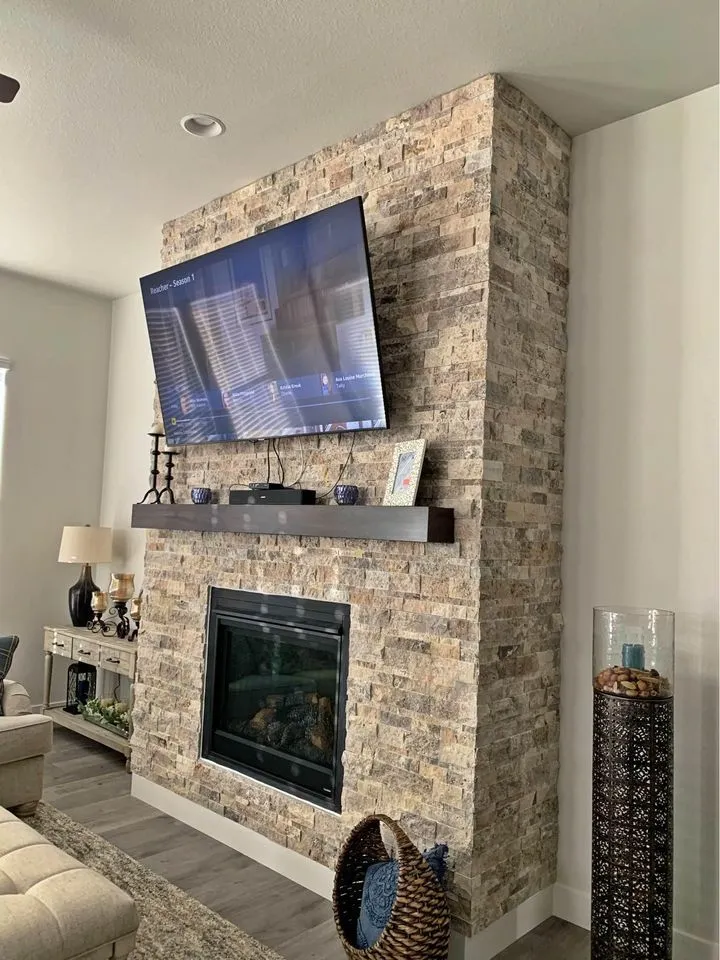 stone outdoor kitchen and patio remodel with durable tile accents